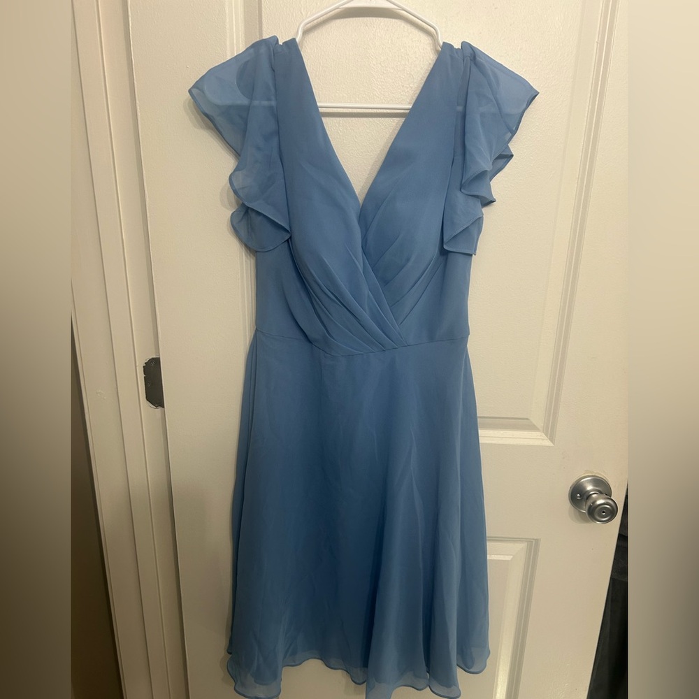 Stacees A-line V neck short flutter sleeves. Chiffon, knee length. 
Size 4
